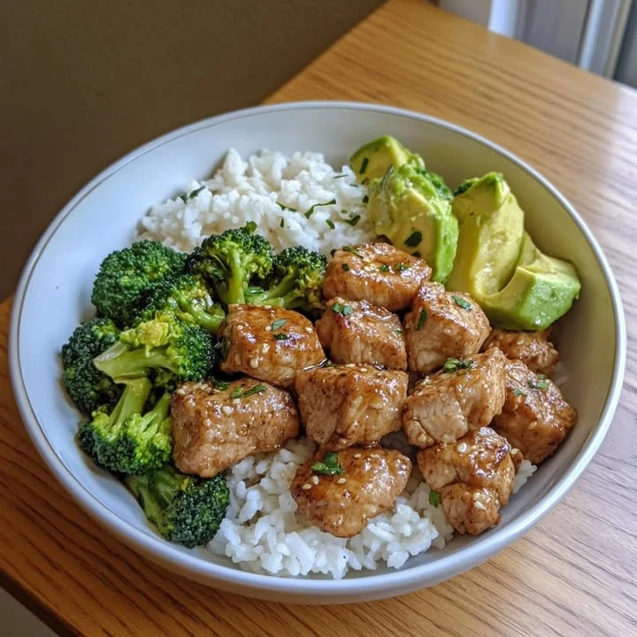 Teriyaki Chicken Bowl with Steamed Rice, Broccoli & Guacamole finished