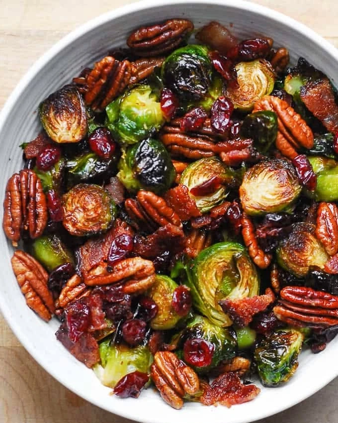 Roasted Brussels Sprouts with Bacon, Toasted Pecans, and Dried Cranberries finished